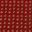 TESSUTO COTONE FANTASIA LETTERE ROSSO